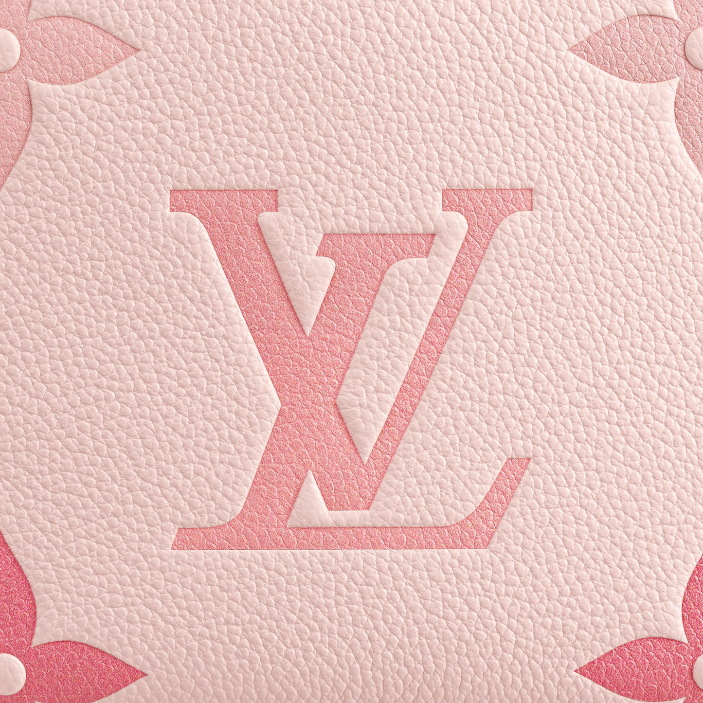 Close-up of a pink textured surface with a logo design