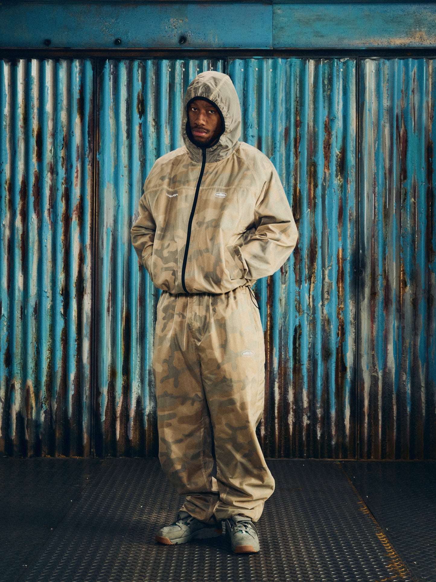Corteiz Brown Nylon Dual-Layer Litework Jacket, Desert Camo, close-up of shock cord bottom hem