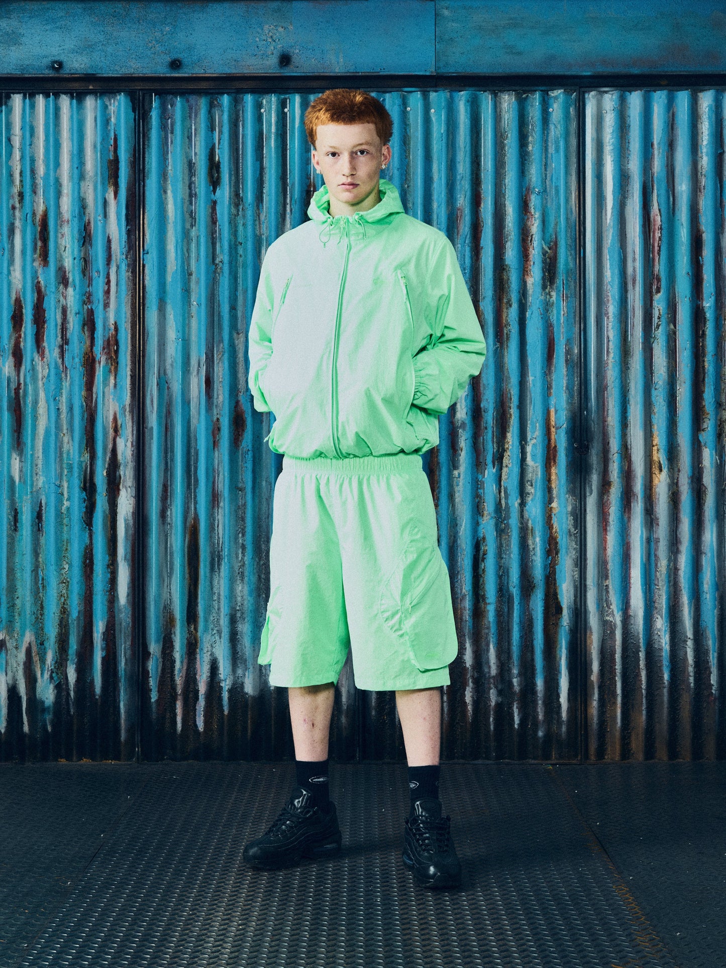 Corteiz Green Nylon Litework Quattro Jacket, close-up of front entry zip pockets