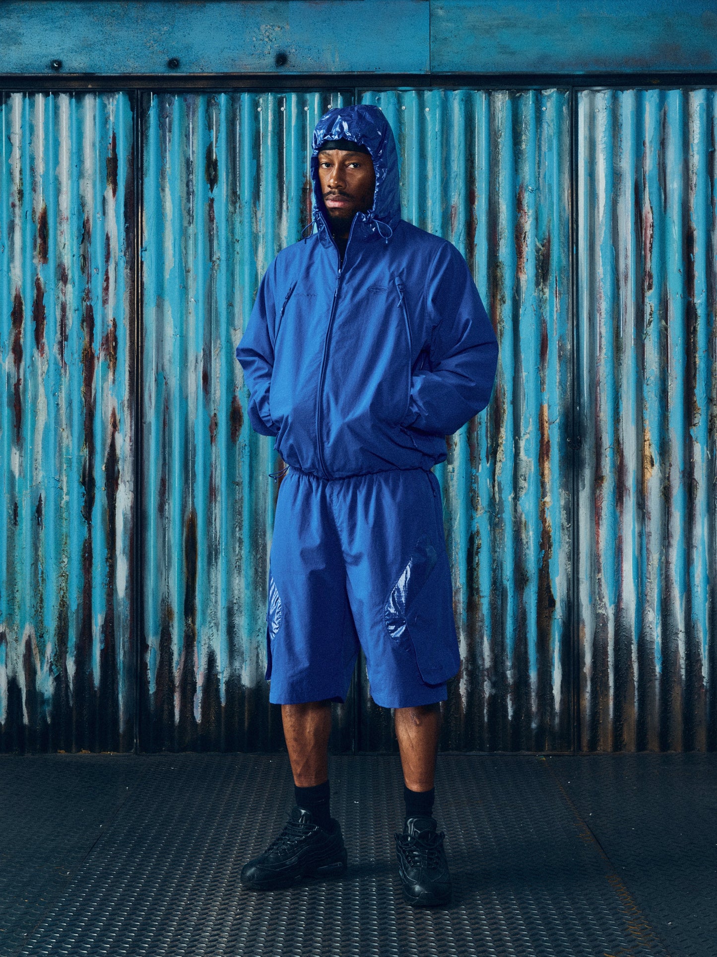Corteiz Blue Nylon Litework Quattro Jacket, Royal Blue, close-up of front entry zip pockets