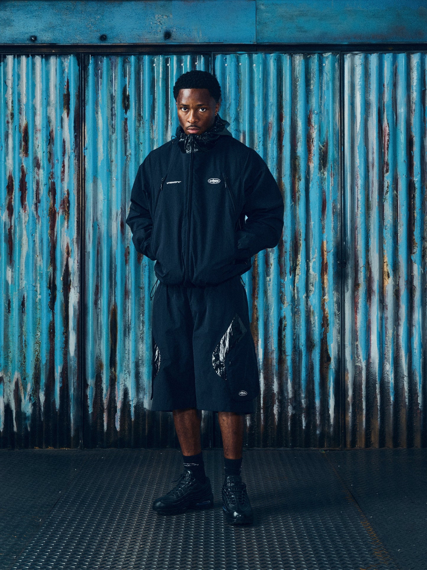 Corteiz Black Nylon Litework Quattro Jacket, close-up of front entry zip pockets