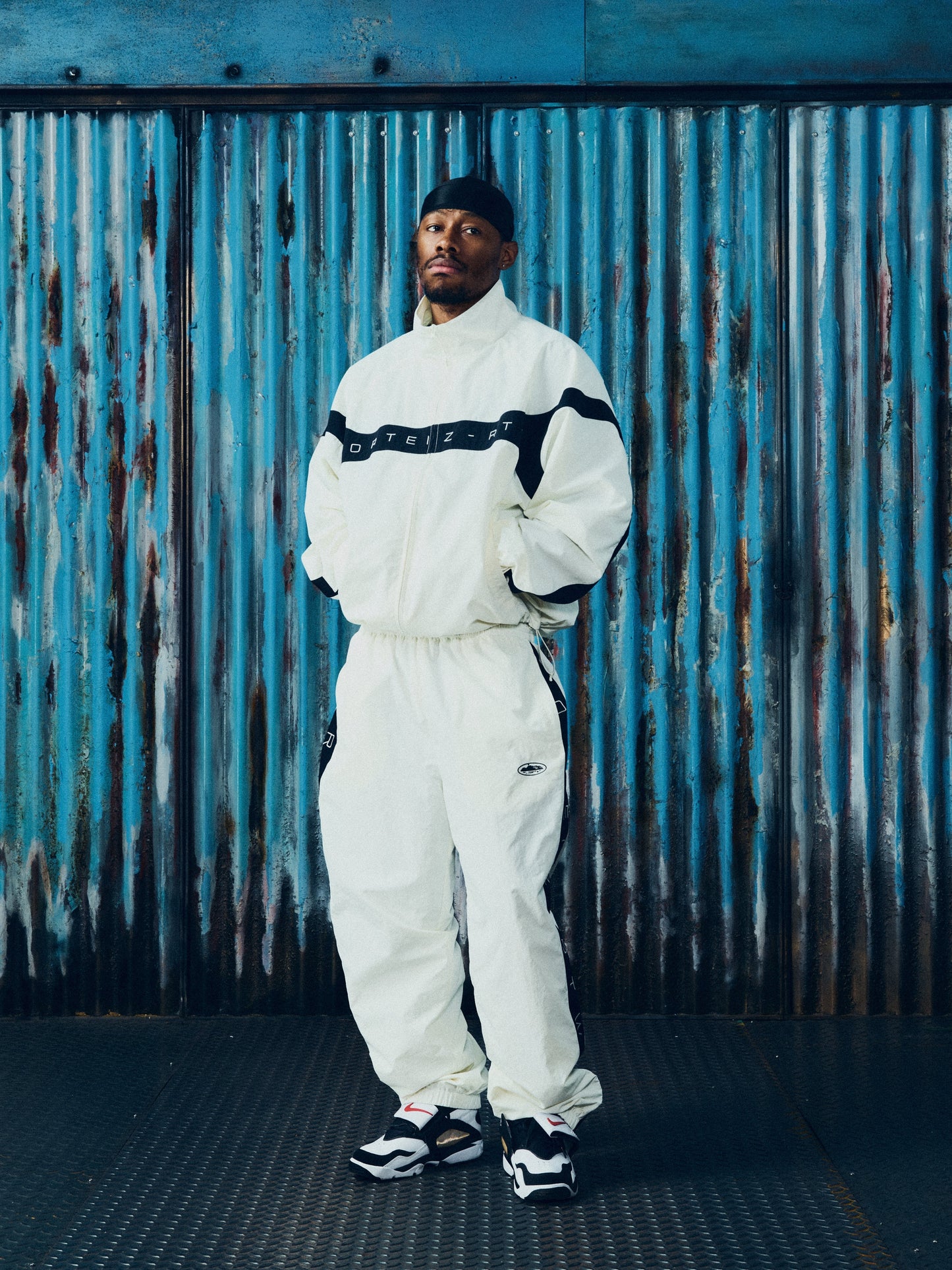 Corteiz White Nylon Strata Shuku Jacket, Off White, close-up of YKK zipper closure