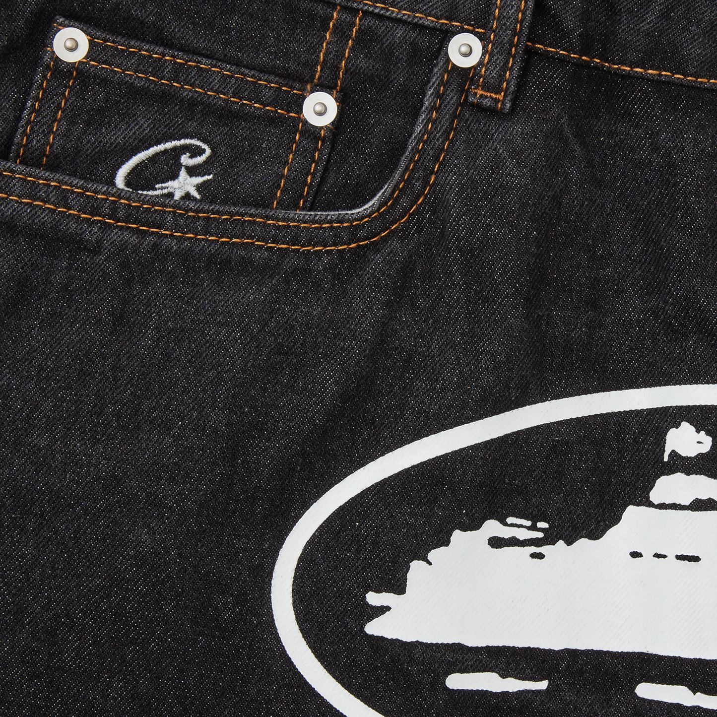Corteiz Black Cotton Denim Shorts, Washed Black, close-up of C-Star shank button and denim texture