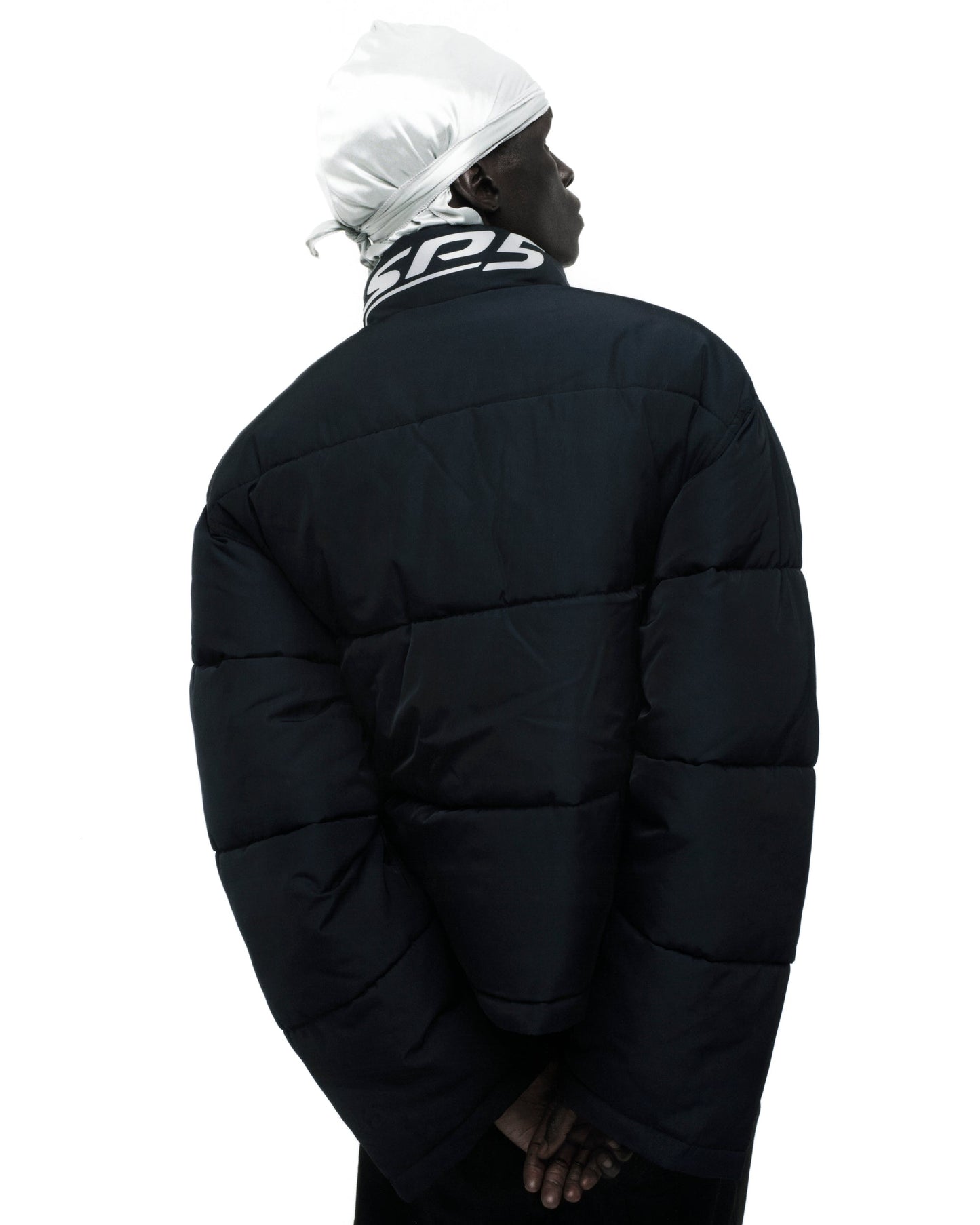 SP5DER Trackhawk Puffer Jacket in Black