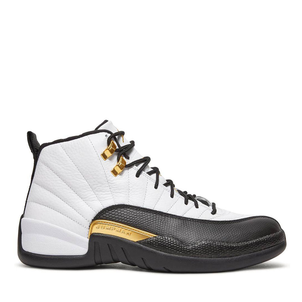 Air Jordan 12 Royalty Taxi sneaker, front view showing black and gold leather upper