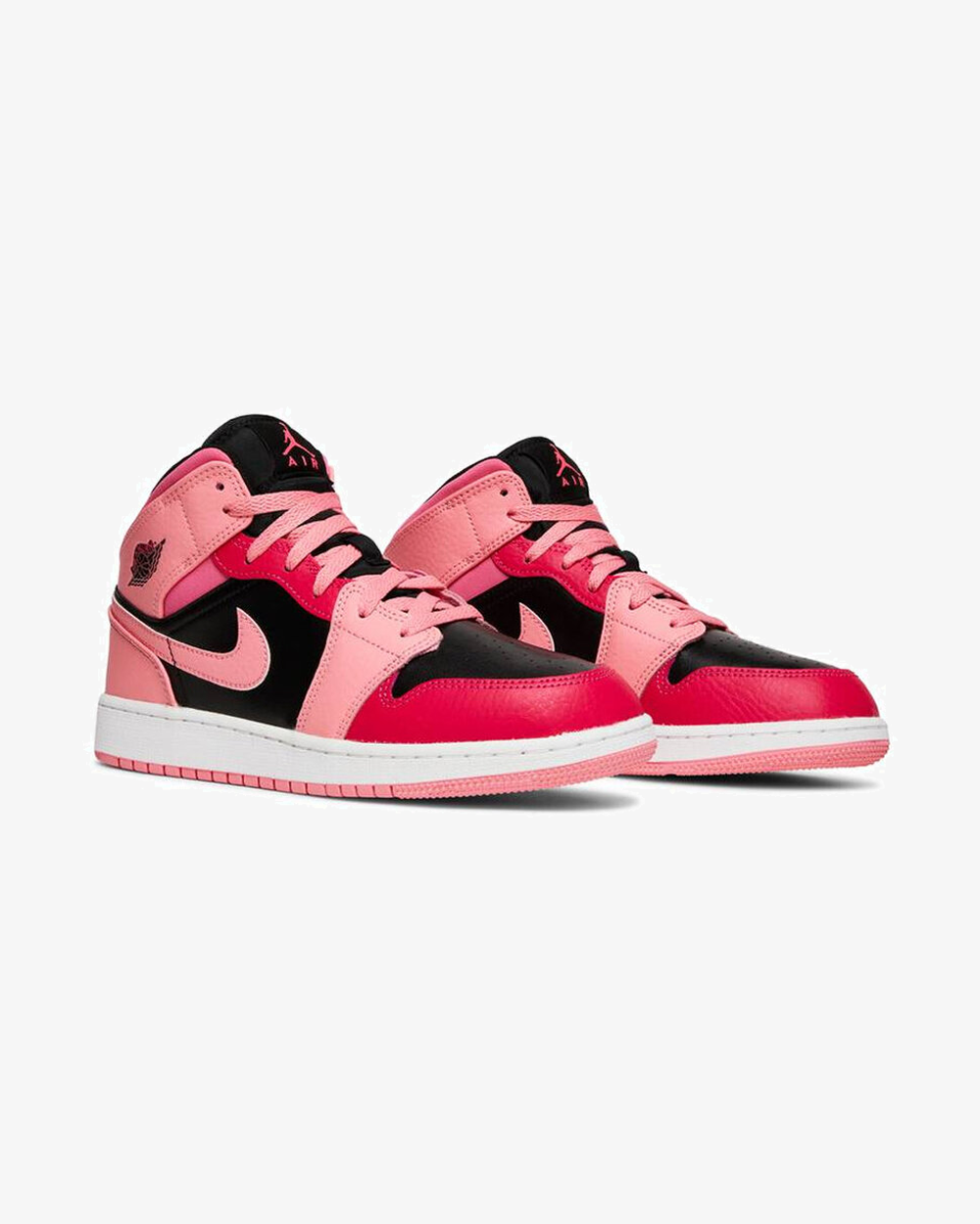 Air Jordan 1 Mid GS Pink Coral Chalk sneaker, angled sole view