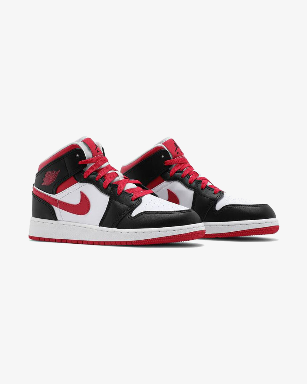 Air Jordan 1 Mid GS White Very Berry sneaker, angled sole view