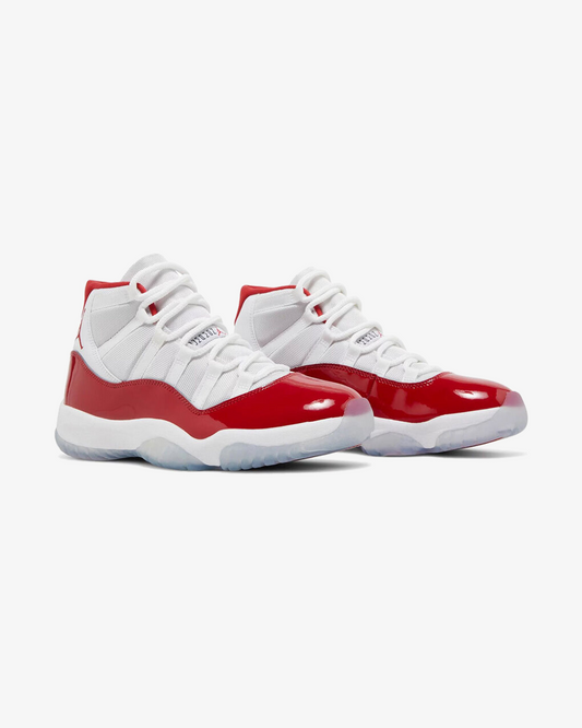 Air Jordan 11 Retro Cherry 2022 sneaker, front view showing white and red patent leather upper