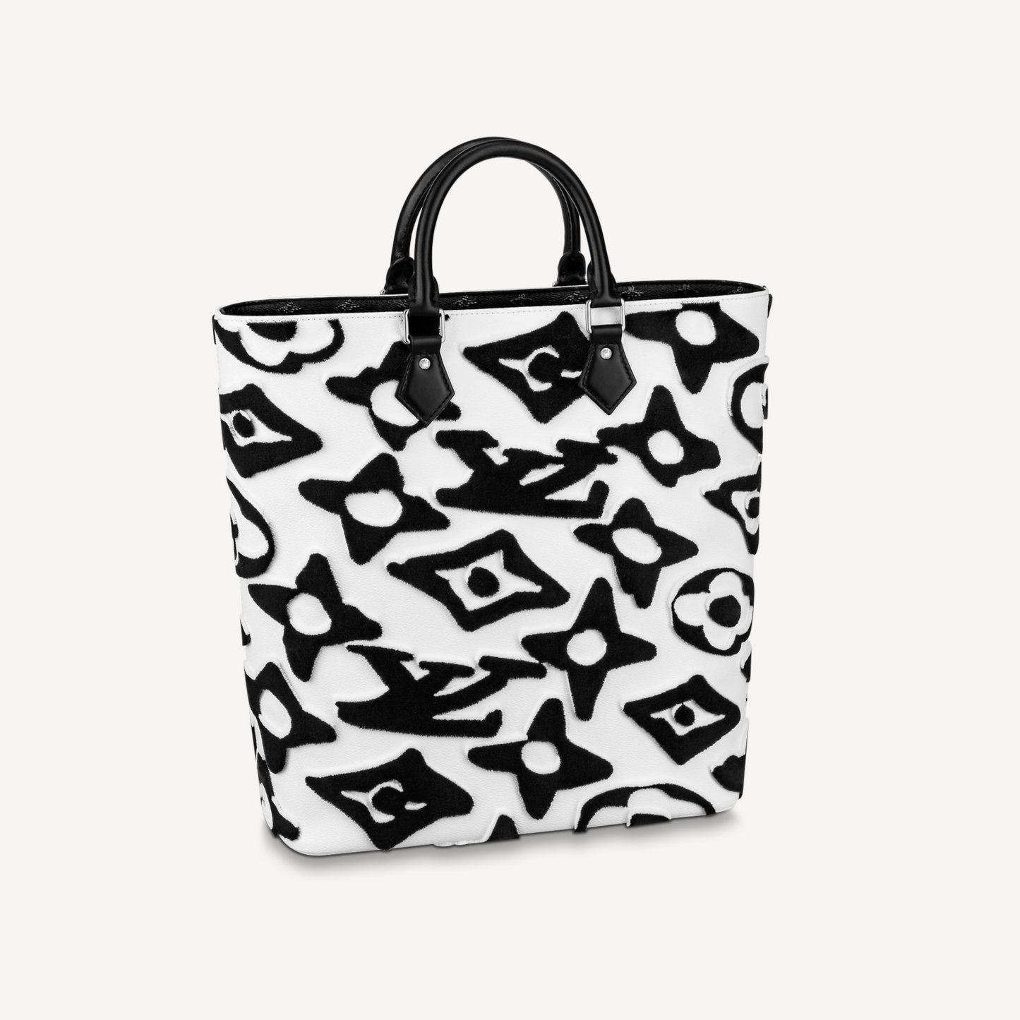 Black and white patterned tote bag on a light gray background