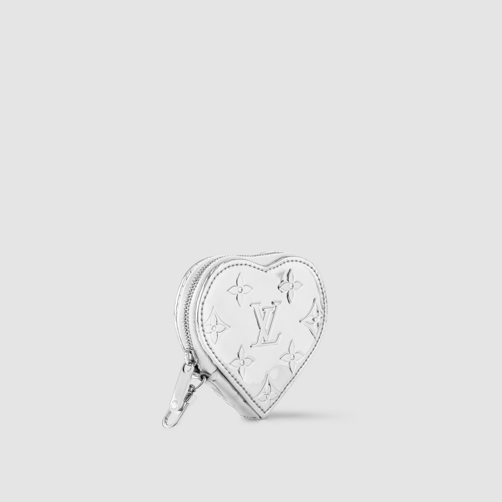 Heart-shaped wallet with brand logo on a light gray background
