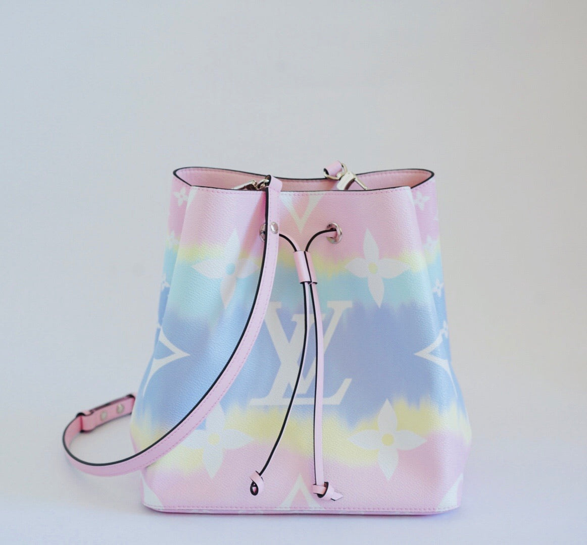 Colorful drawstring bag with a brand logo on a light gray background