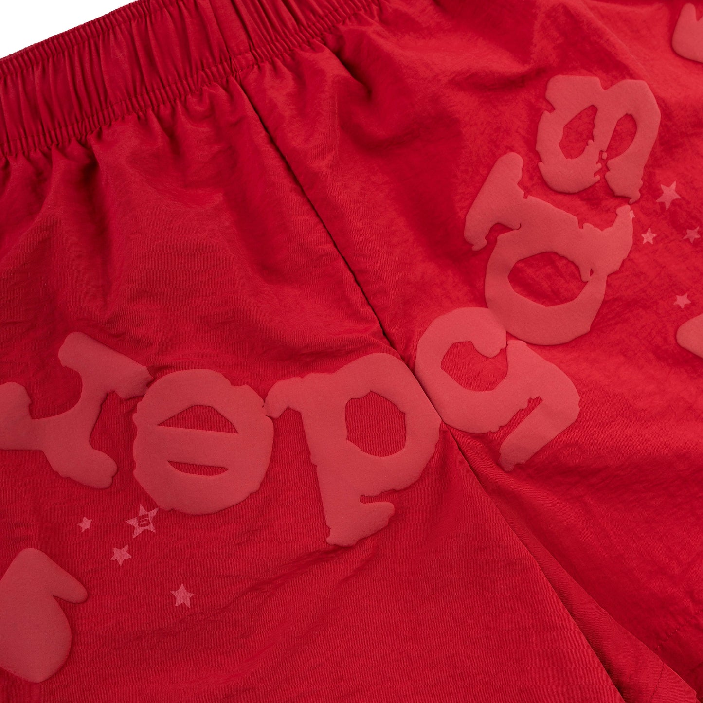 Side view of SP5DER Beluga Double Layer Short in Red