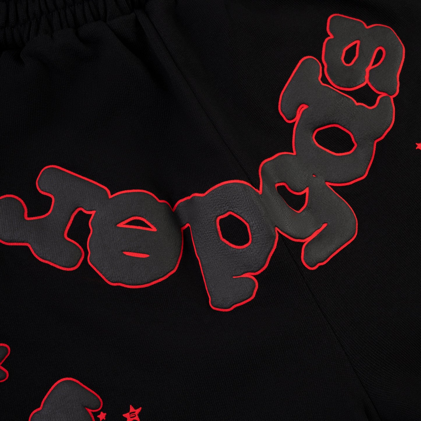 Side view of SP5DER Beluga Outline Sweatshort in Black