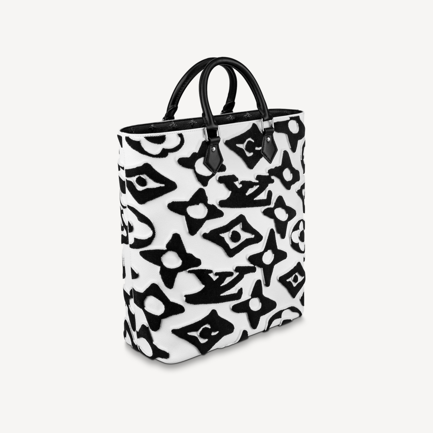 Black and white patterned tote bag on a light gray background