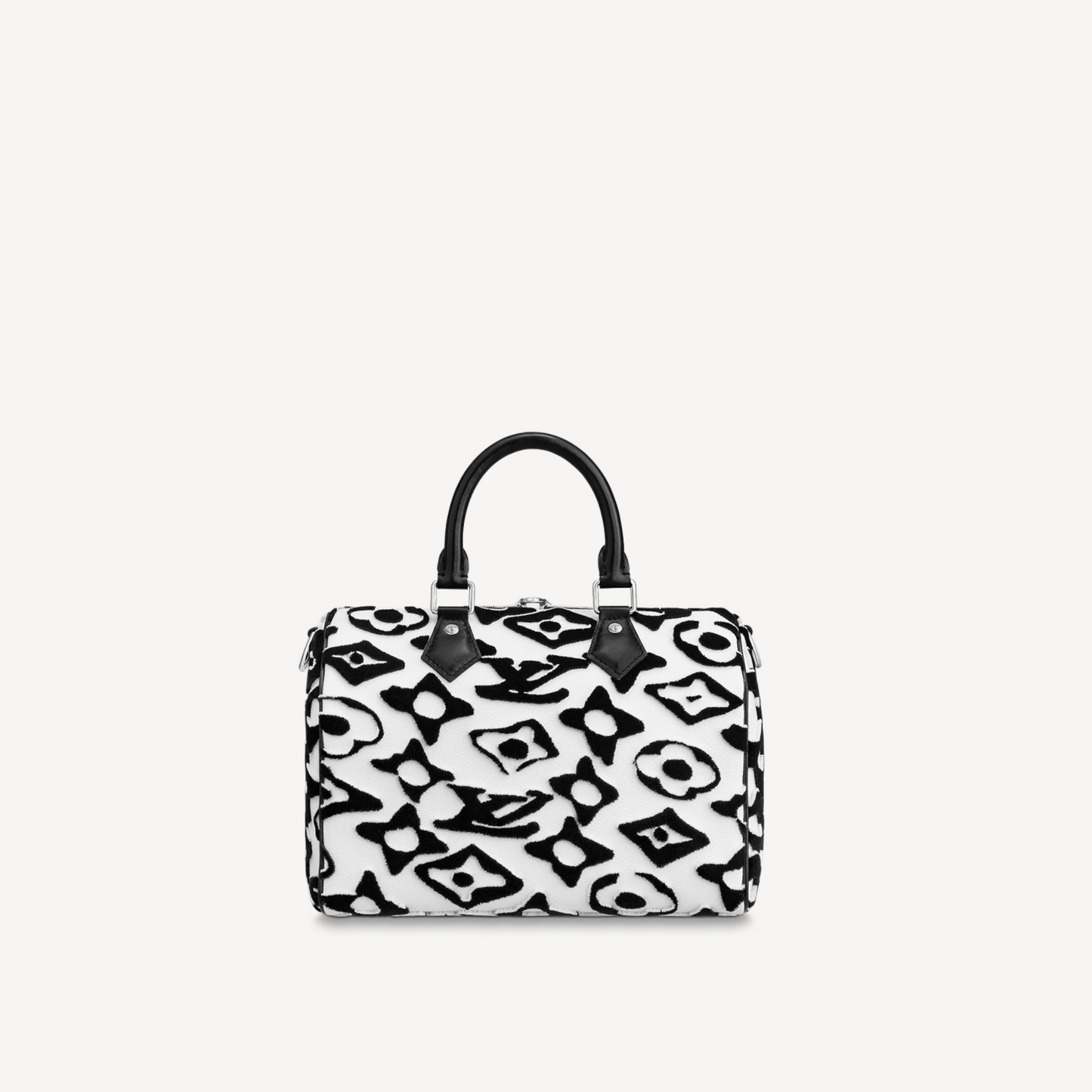 Black and white patterned handbag on a light gray background