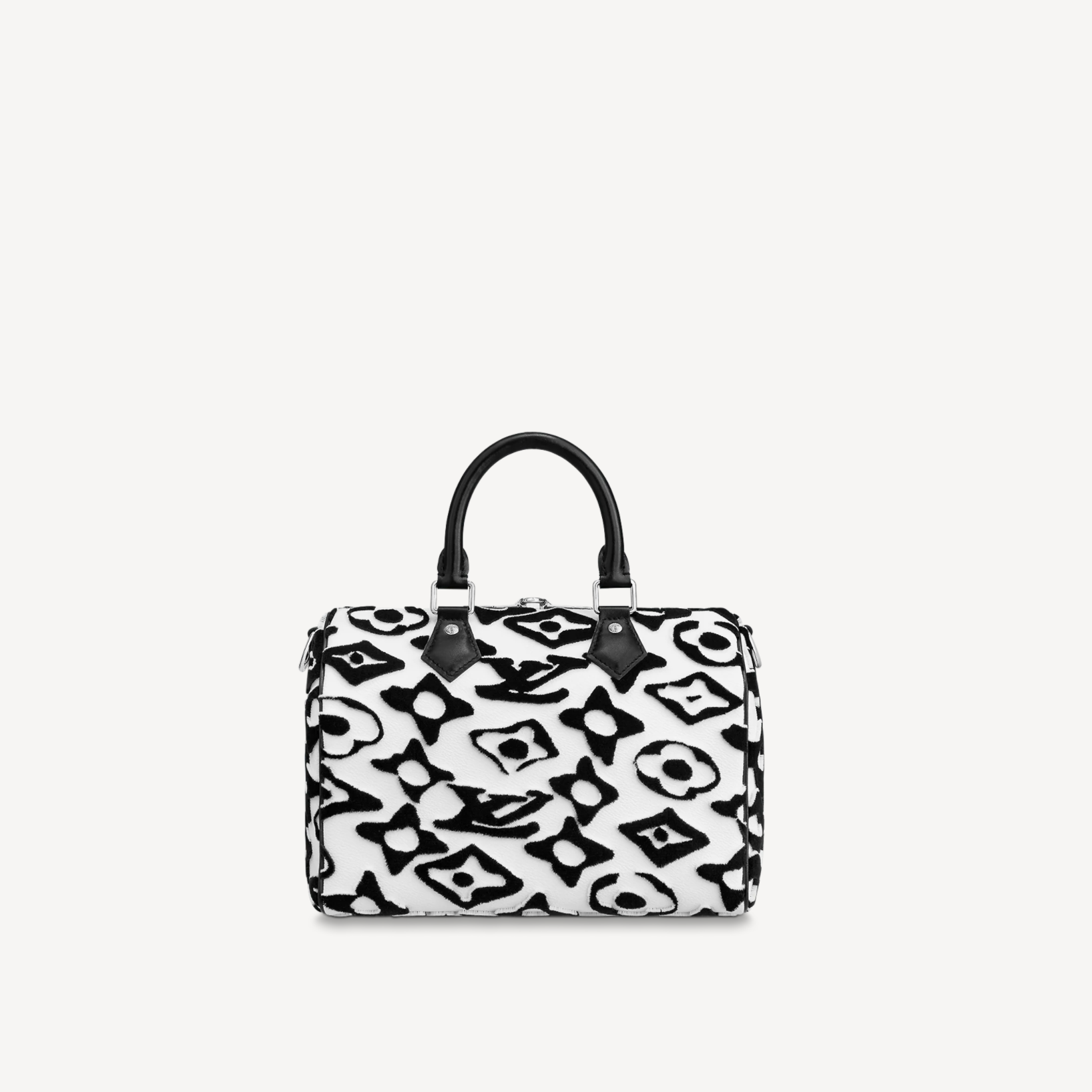 Black and white patterned handbag on a light gray background
