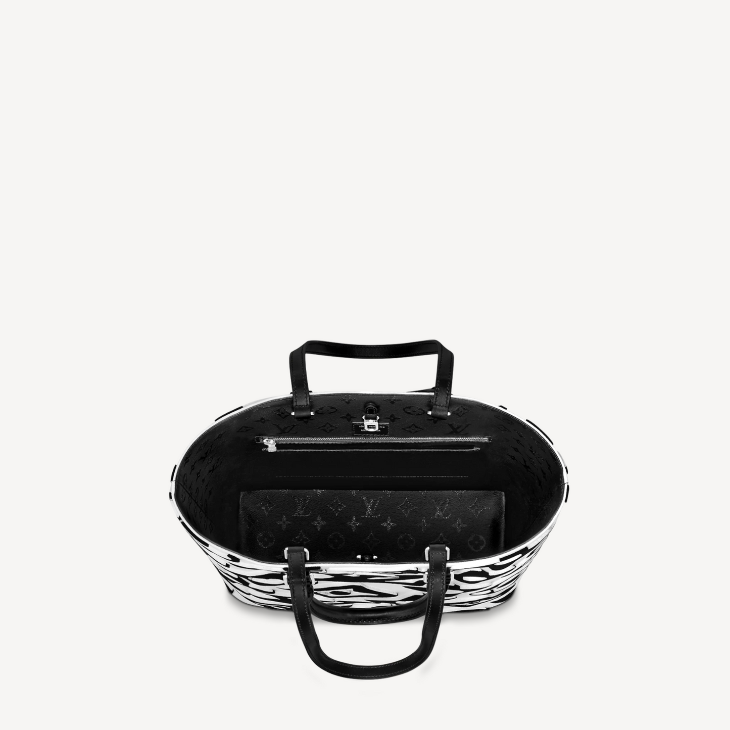 Black and white patterned suitcase with handles on a light gray background