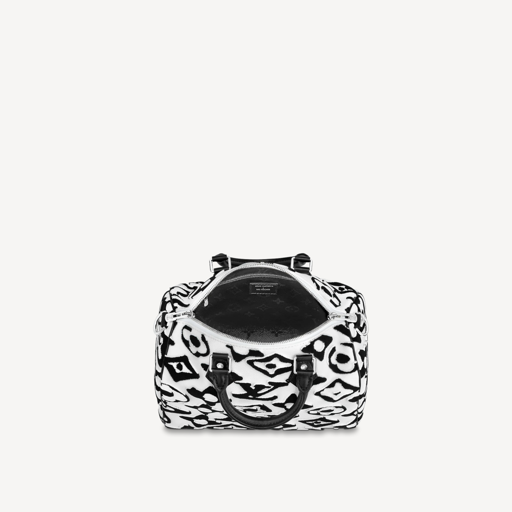 Black and white patterned handbag on a light gray background