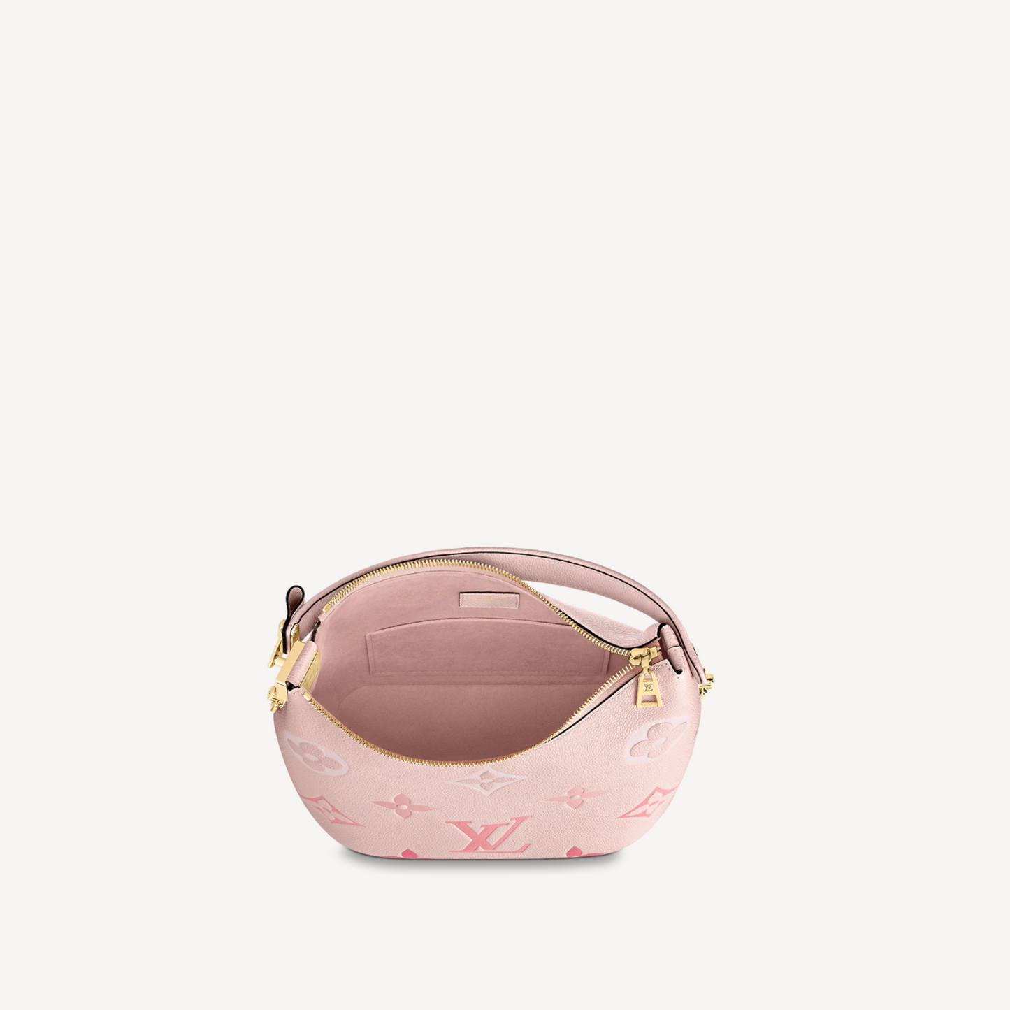 Pink handbag with gold accents on a light gray background