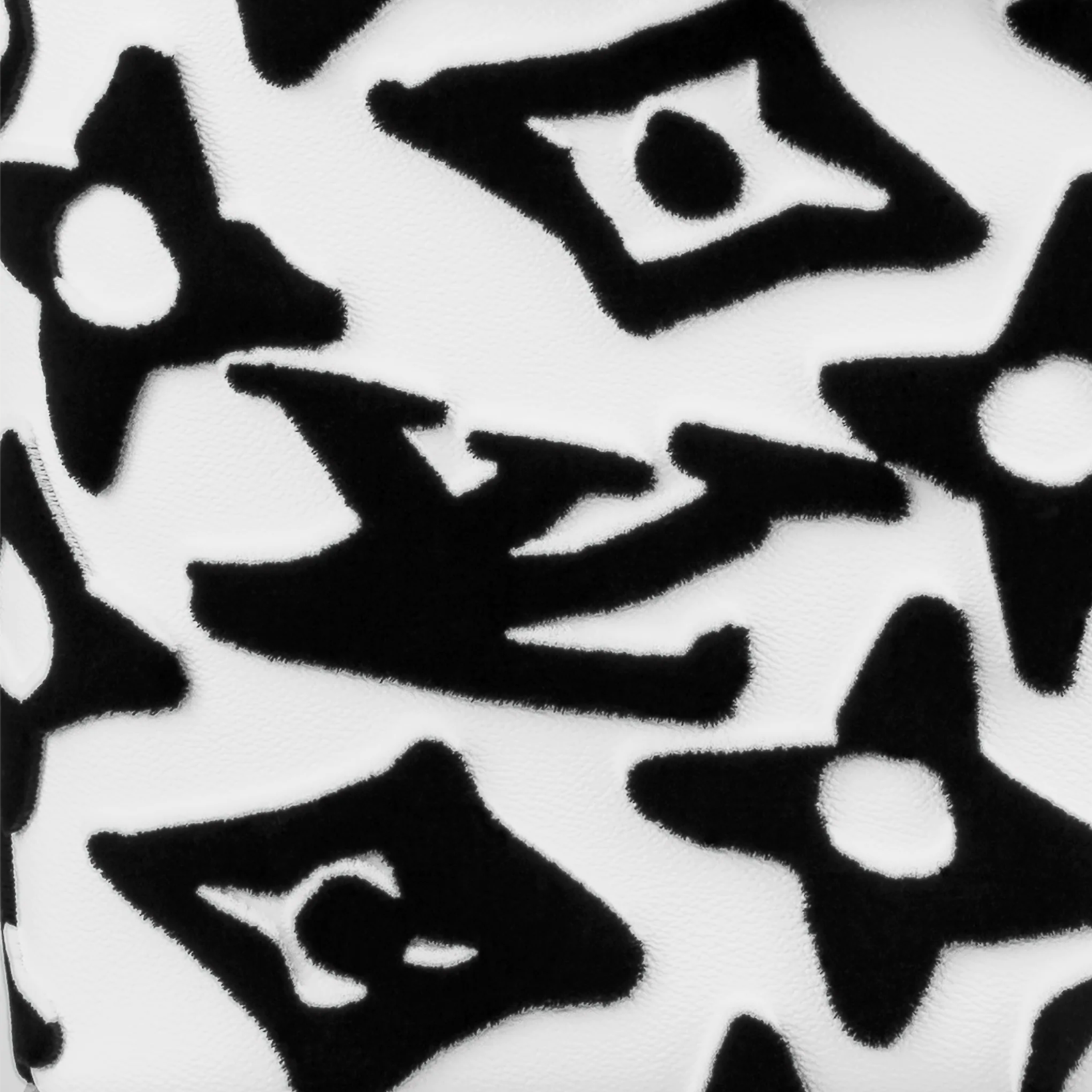 Black geometric shapes on a white background