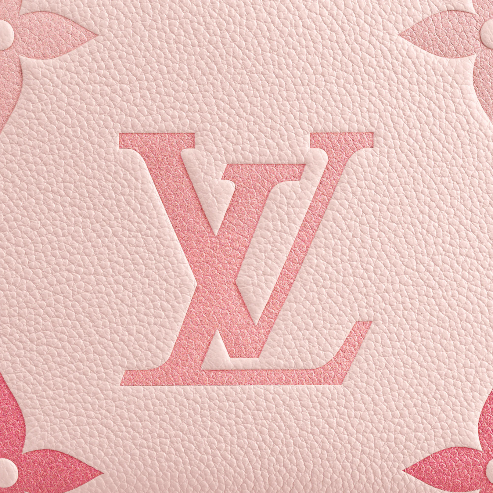 Close-up of a pink textured surface with a logo design