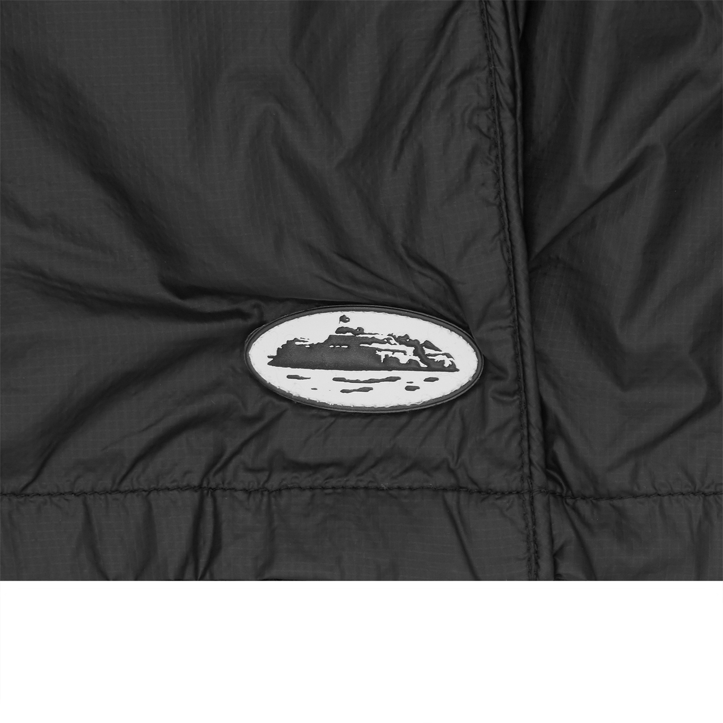 Corteiz Black Nylon Cargo Shorts, side view showing mesh lining and side pockets