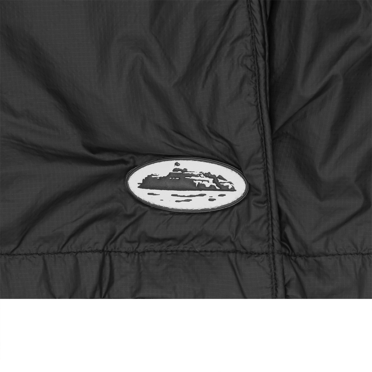 Corteiz Black Nylon Cargo Shorts, side view showing mesh lining and side pockets