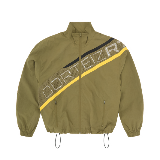 Corteiz Green Nylon Bias Panel Shuku Jacket, Olive, front view showing bias panel design