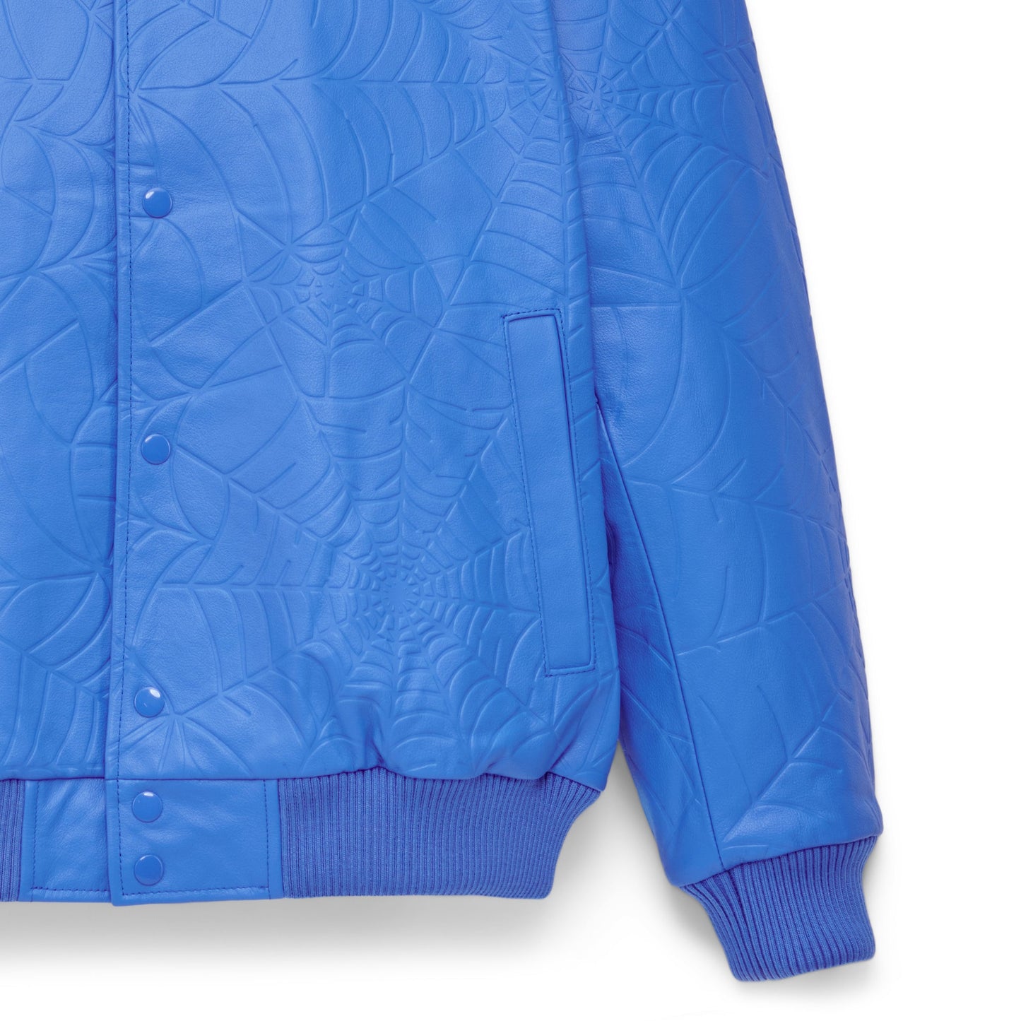 Detail view of debossed web design on SP5DER Debossed Web Leather Jacket in Blue