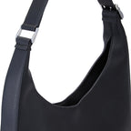 Close-up of silver-tone hardware on the Bag It Danny Flatiron black leather shoulder bag