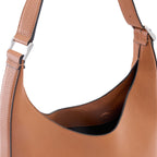Close-up of hardware and stitching on the Bag It Danny Flatiron clay leather shoulder bag