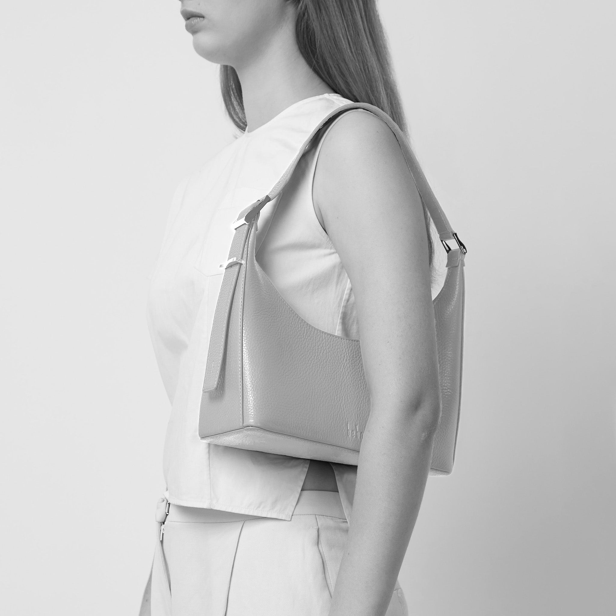 Bag It Danny Flatiron ocean blue leather shoulder bag worn on the shoulder