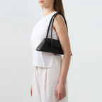 Bag It Diana black leather shoulder bag worn on the shoulder