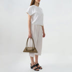 Bag It Diana palm green leather shoulder bag carried by hand