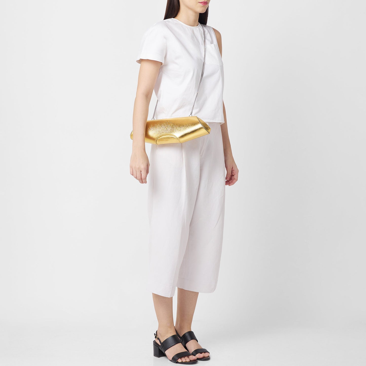 Bag It Elizabeth metallic gold baguette clutch worn crossbody