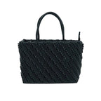 Black woven handbag on a white background