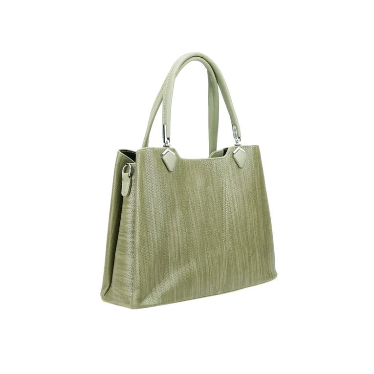 Green handbag with textured surface on a white background