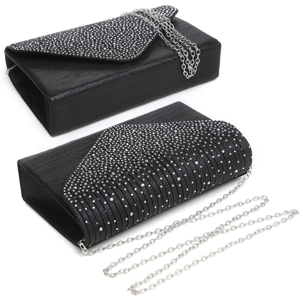 Black clutch bag with silver chain strap on a white background