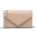 Beige crocodile-textured clutch bag with a chain strap on a white background