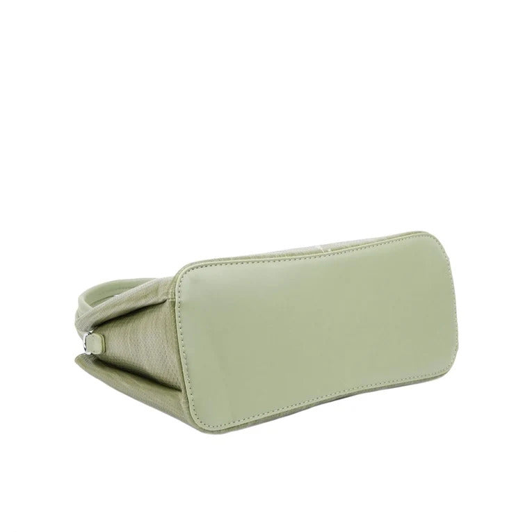 Light green clutch bag on a white background