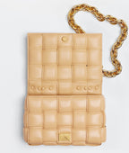 Beige quilted handbag with a gold chain on a light gray background