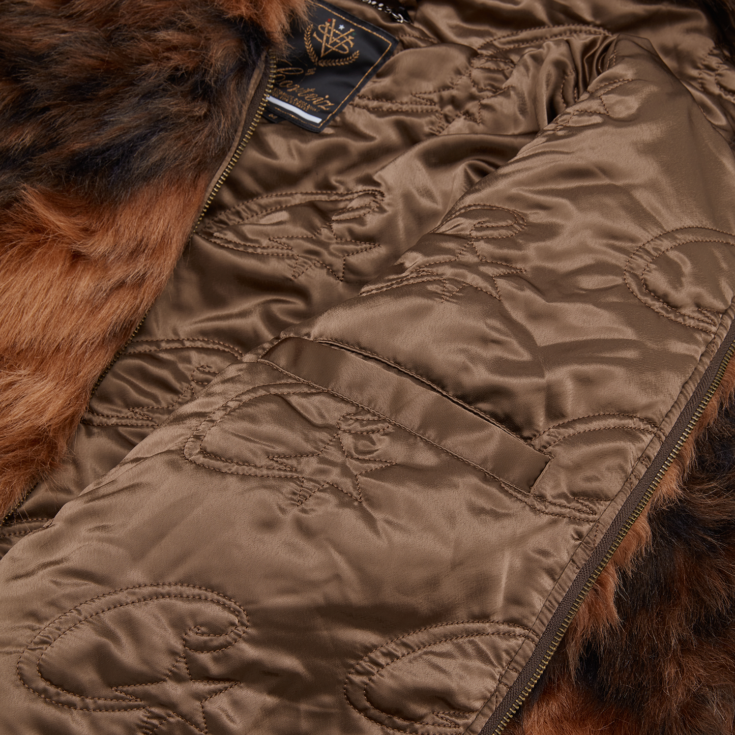 Corteiz Brown Faux Fur Diamond Hooded Jacket, side view showing welt side entry pocket