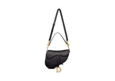 Side view of Dior Saddle Bag with Strap in Black Grained Calfskin