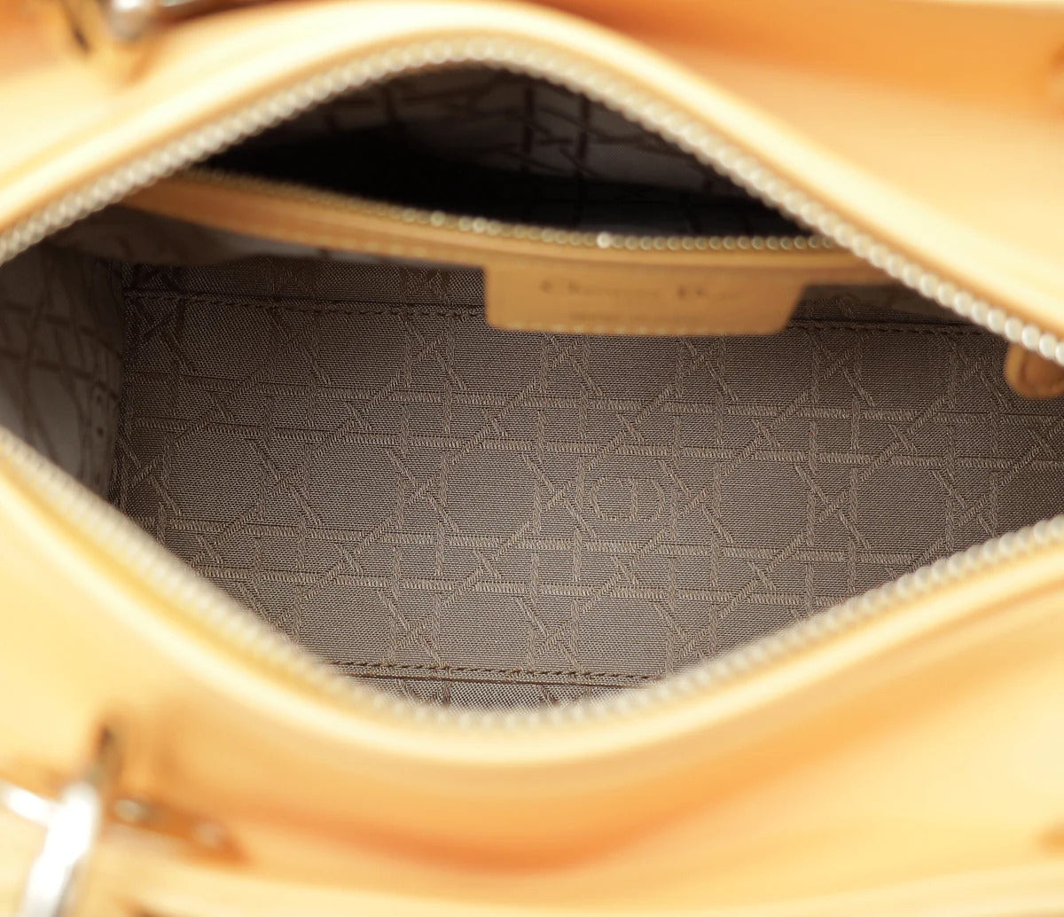 Detail view of Cannage stitching on Dior Medium Lady Dior Bag in Coffee Brown