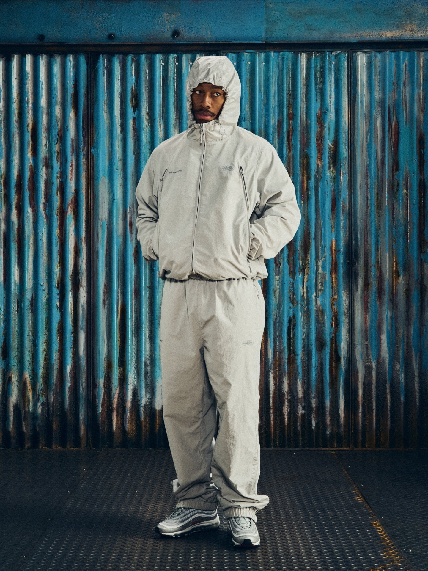 Corteiz Grey Nylon Litework Quattro Jacket, close-up of front entry zip pockets