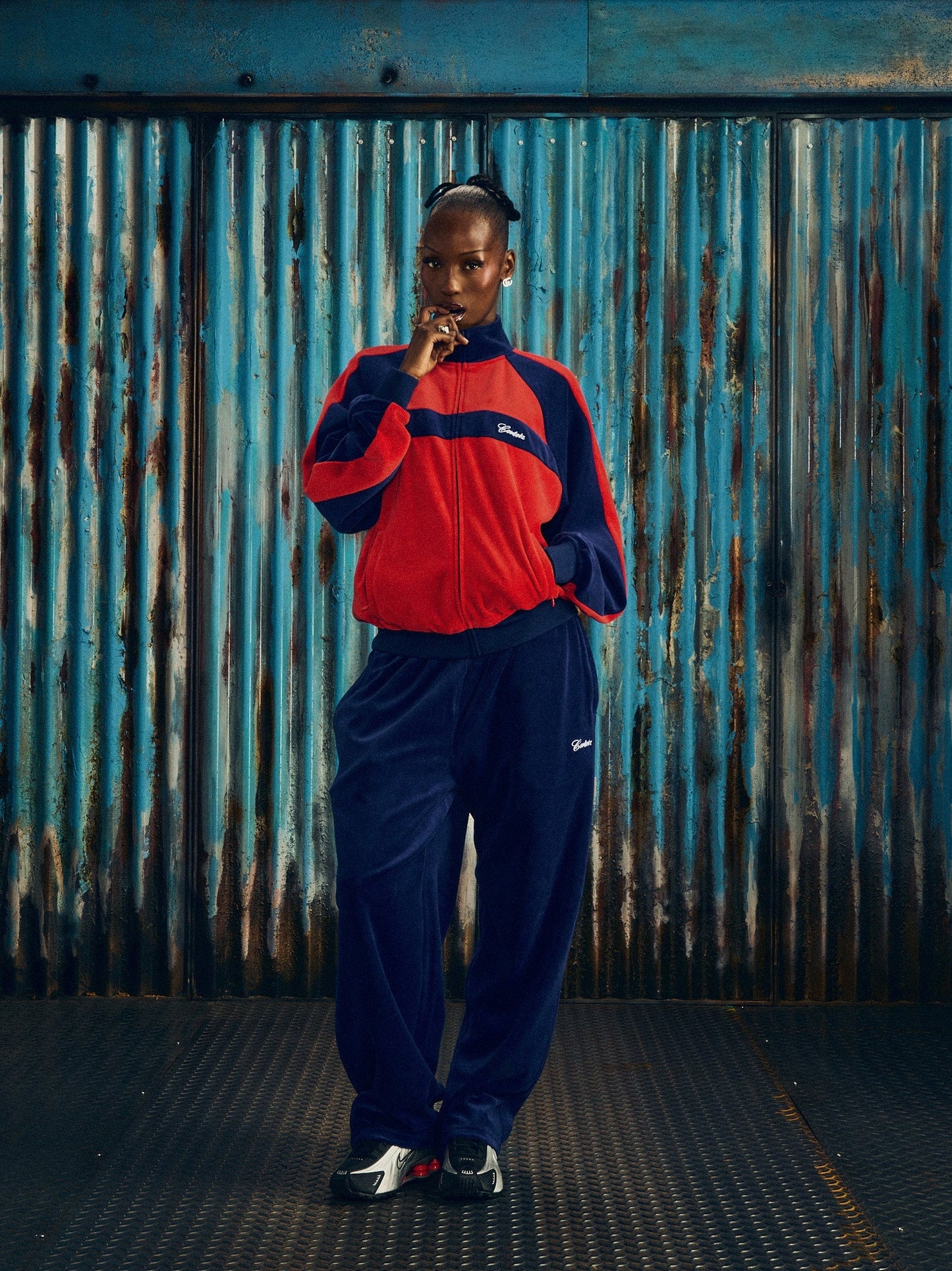 Corteiz Blue Cotton Velour Pista Track Jacket, Navy/Red, side view showing raglan sleeve construction