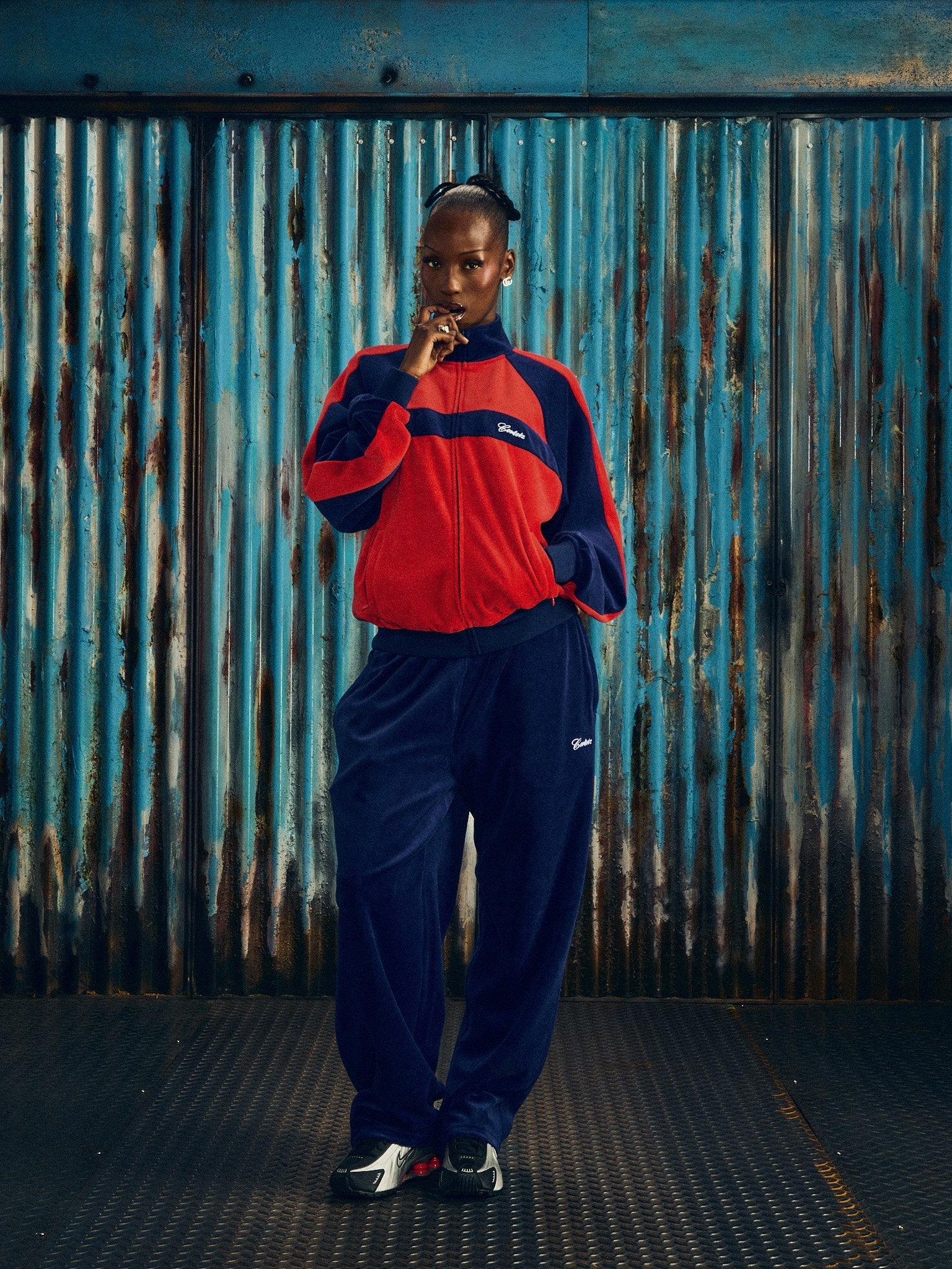 Corteiz Blue Cotton Velour Pista Track Jacket, Navy/Red, side view showing raglan sleeve construction