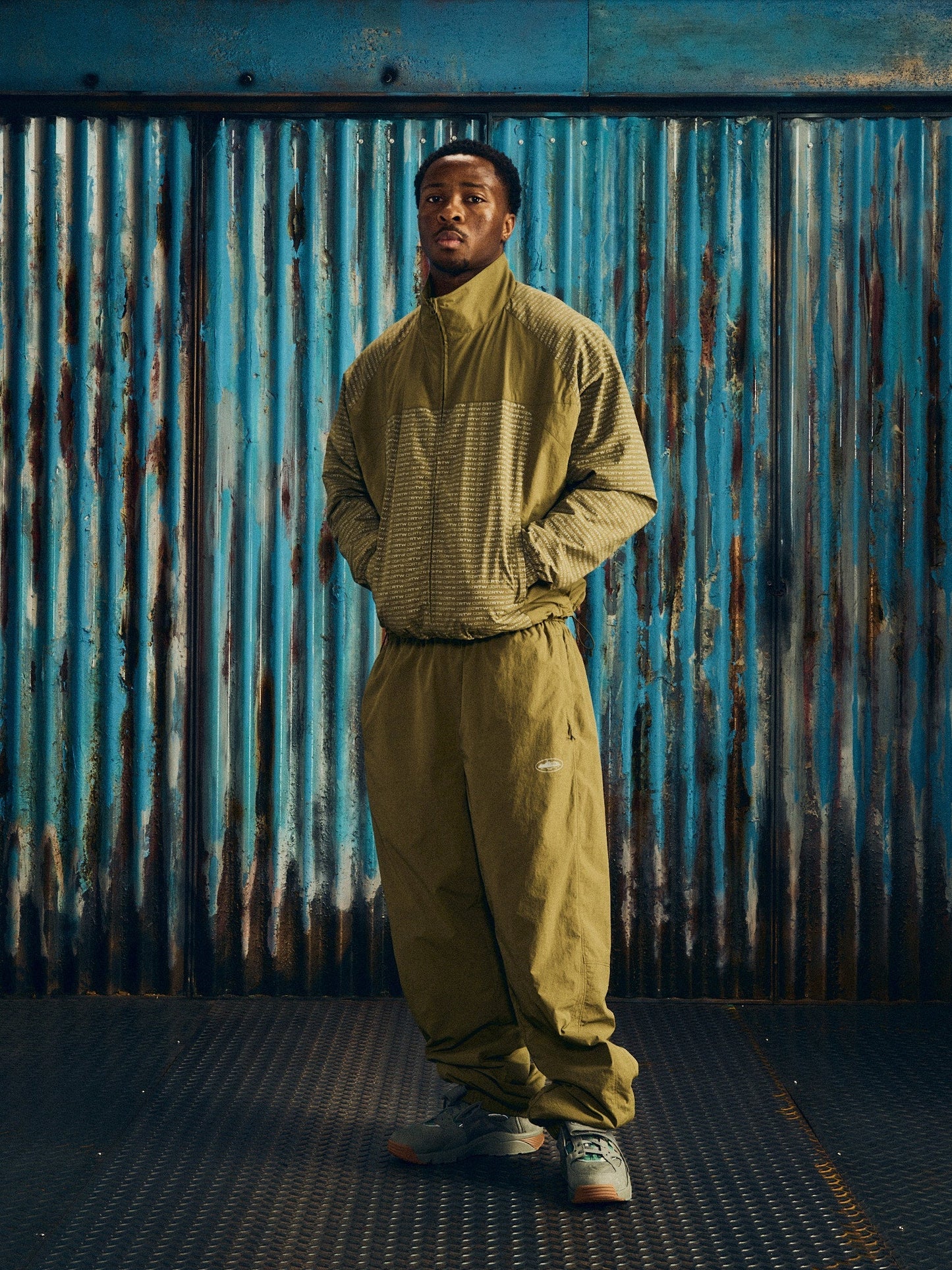 Corteiz Green Nylon Static Shuku Jacket, Olive, close-up of shock cord bottom hem