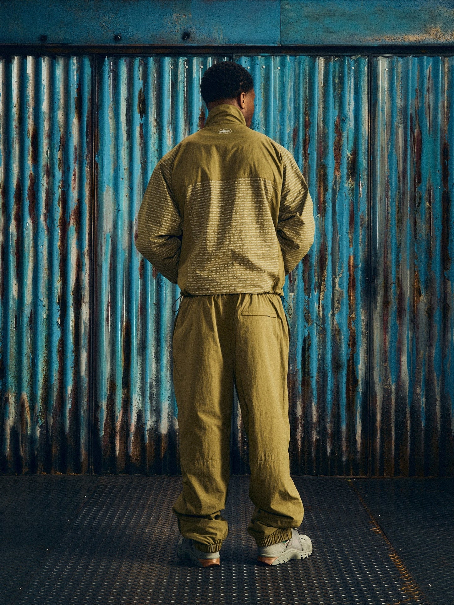 Corteiz Green Nylon Static Shuku Jacket, Olive, close-up of YKK zipper closure