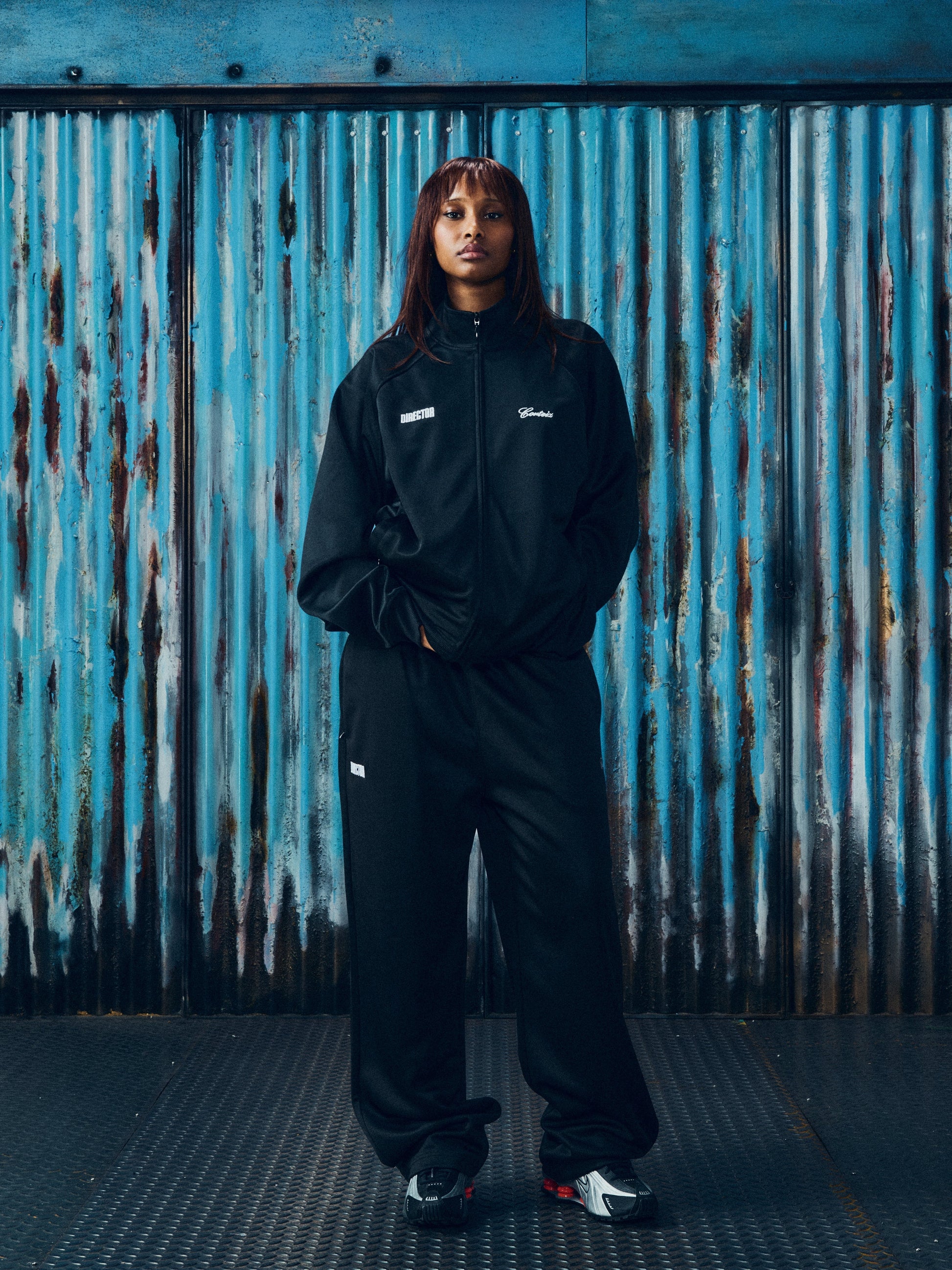 Corteiz Black Tricot Poly Gabriel Moses Track Jacket, close-up of raglan sleeve construction